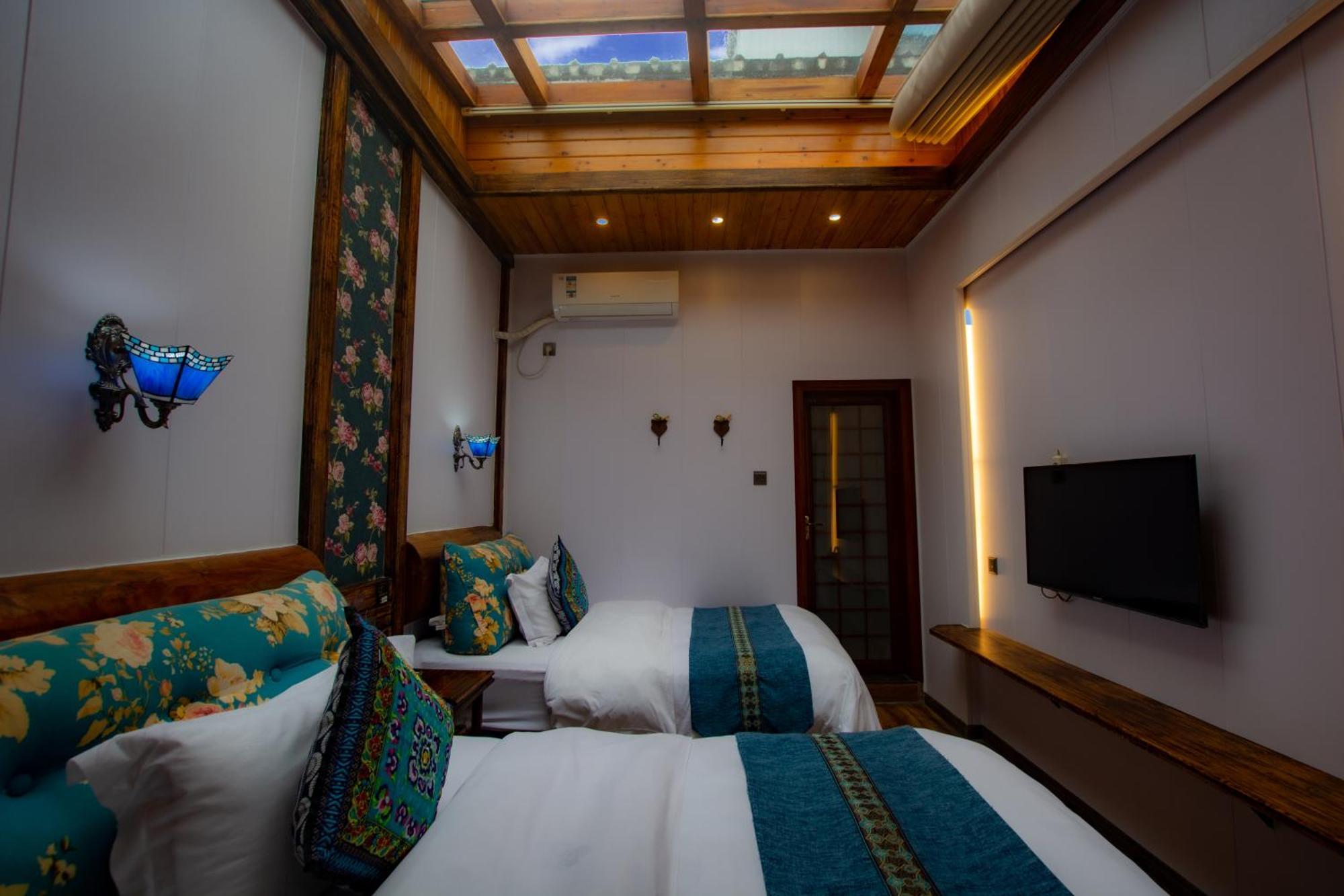 Floral Hotel - Baihui Living Чжанцзяцзе Экстерьер фото